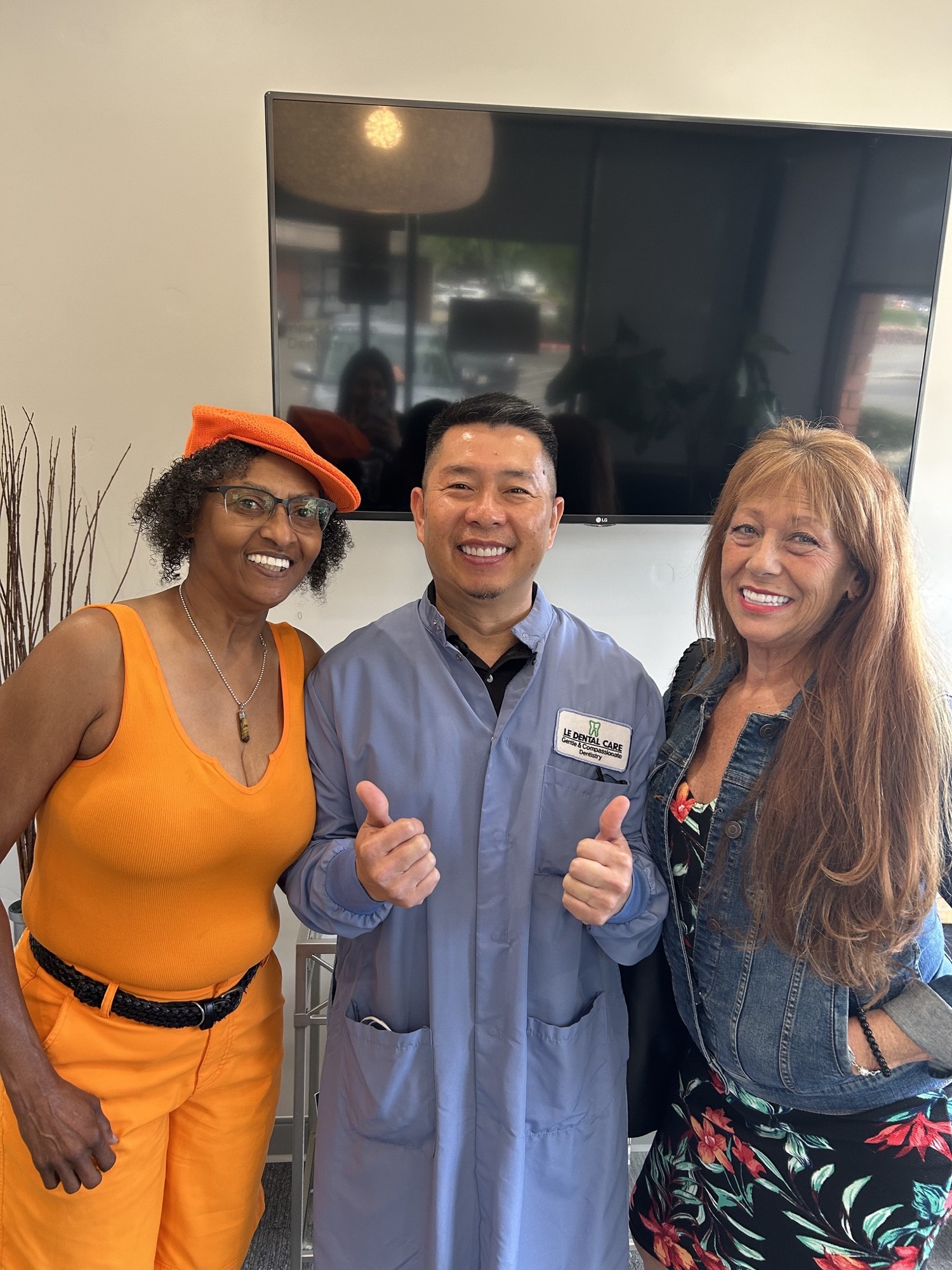 Stockton patient smiling with Dr. Le after visit